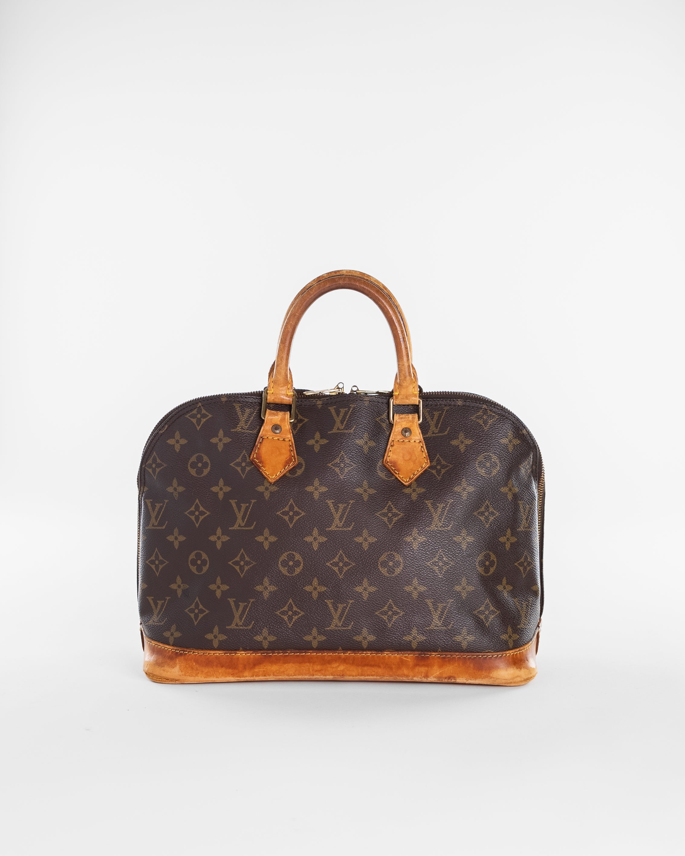 Monogram Alma Hand Bag