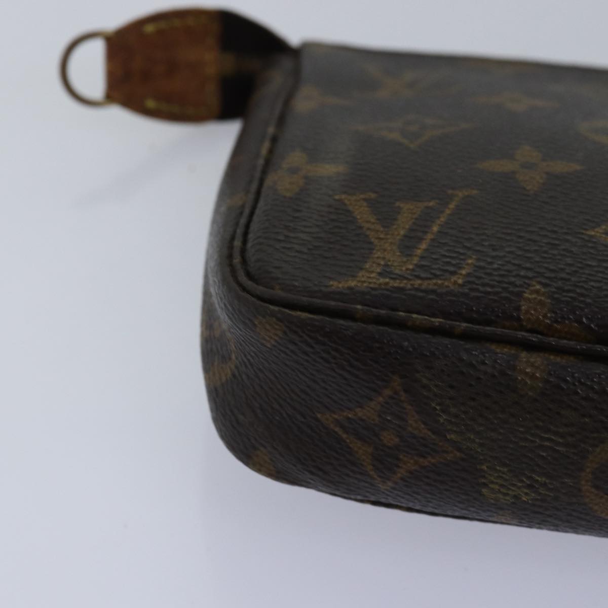 Monogram Pochette -tarvikepussi