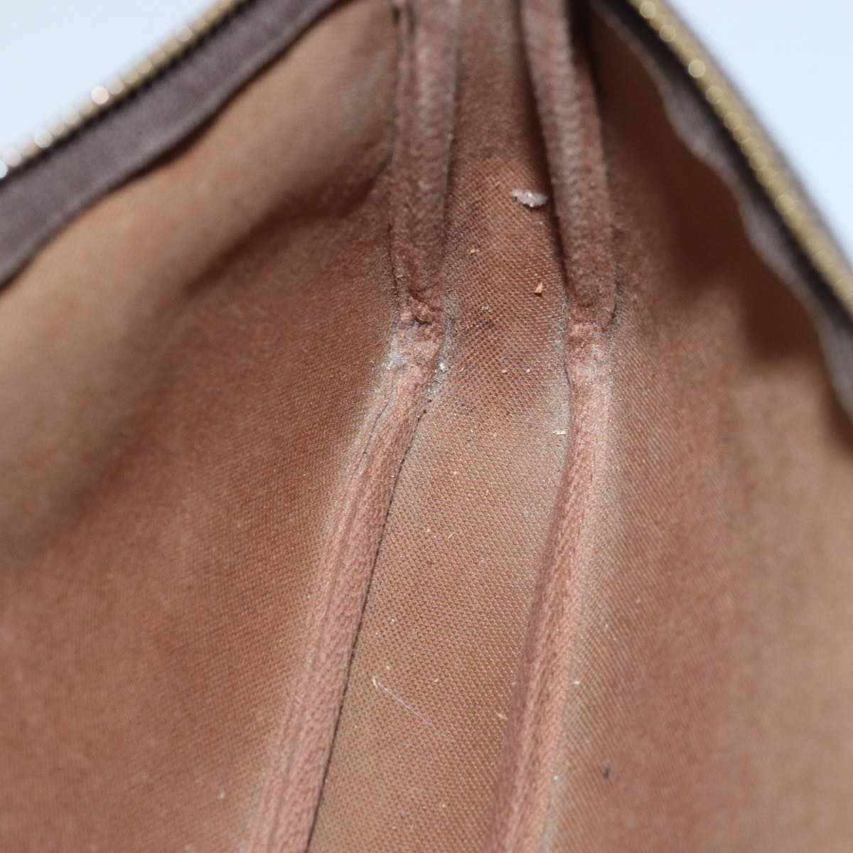 Monogram Pochette -tarvikepussi