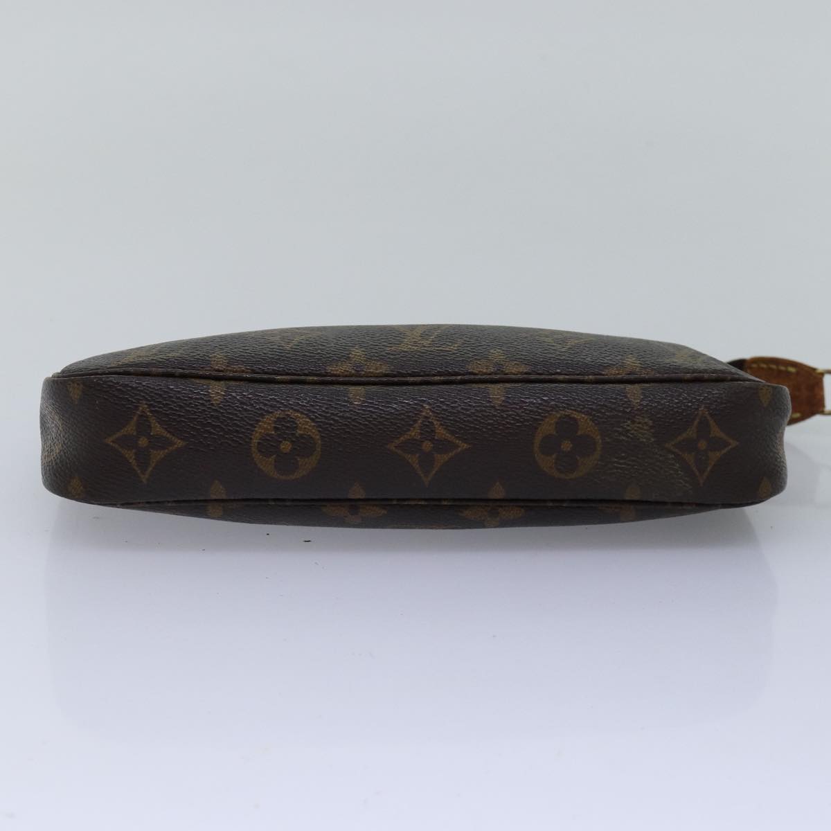 Monogram Pochette -tarvikepussi