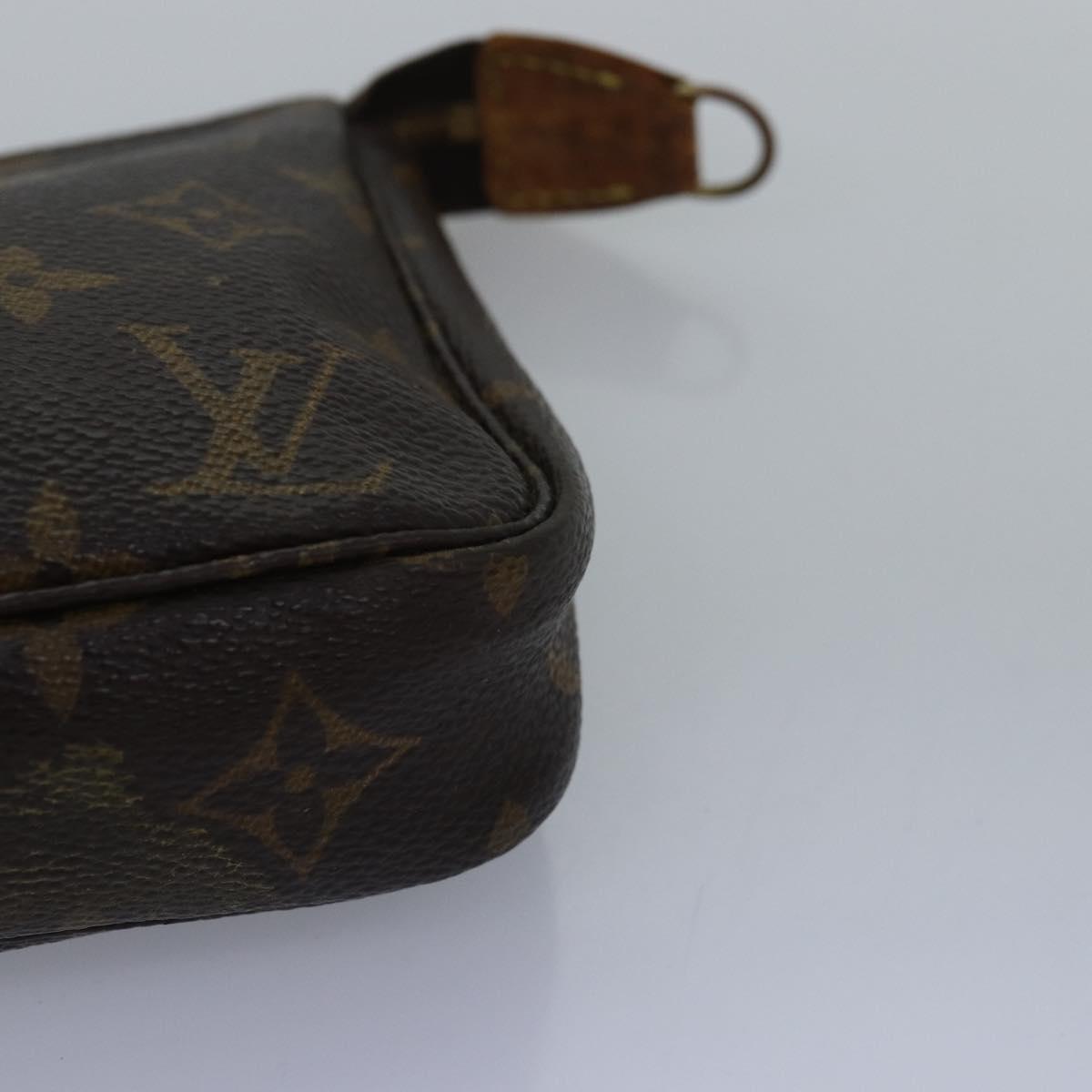 Monogram Pochette -tarvikepussi