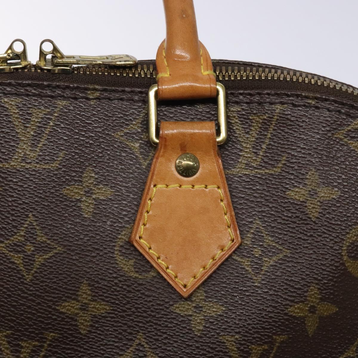 Monogram Alma Hand Bag