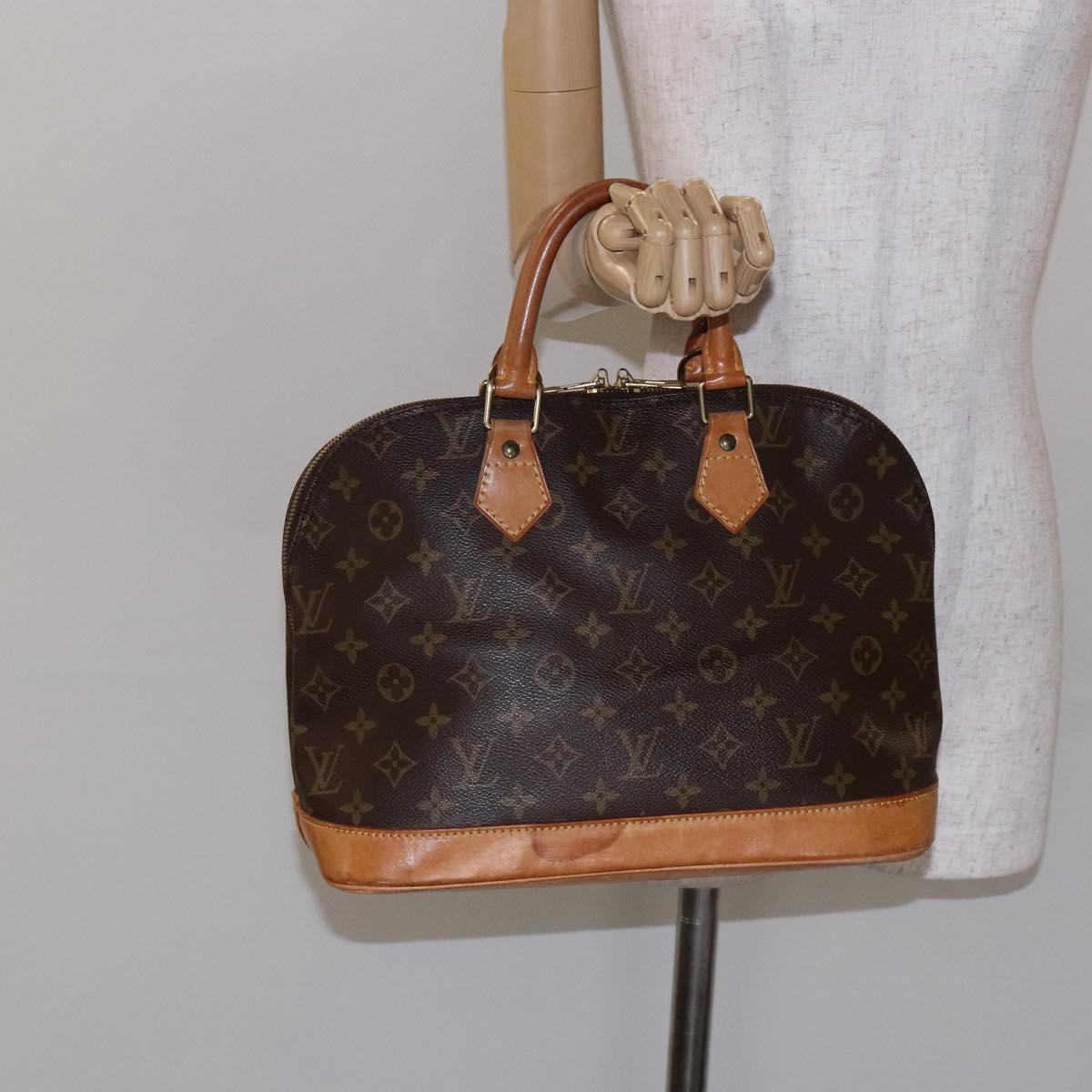 Monogram Alma Hand Bag