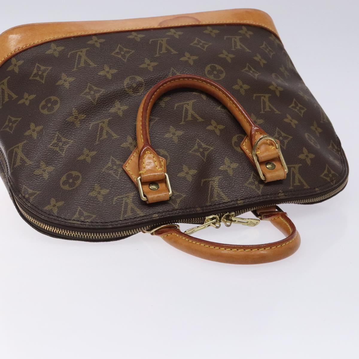 Monogram Alma Hand Bag