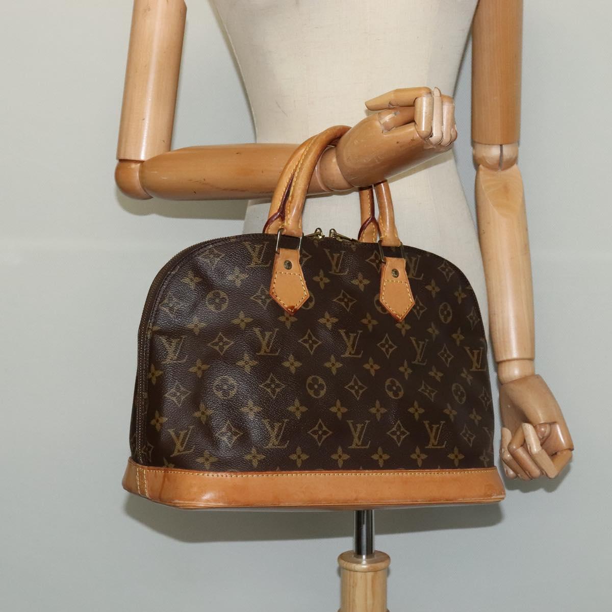 Monogram Alma Hand Bag