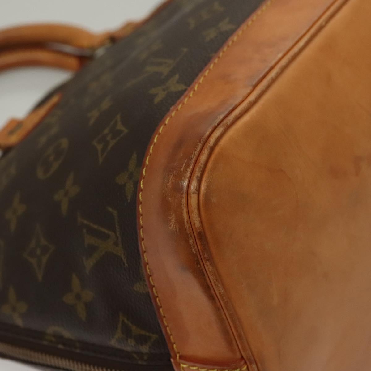 Monogram Alma Hand Bag
