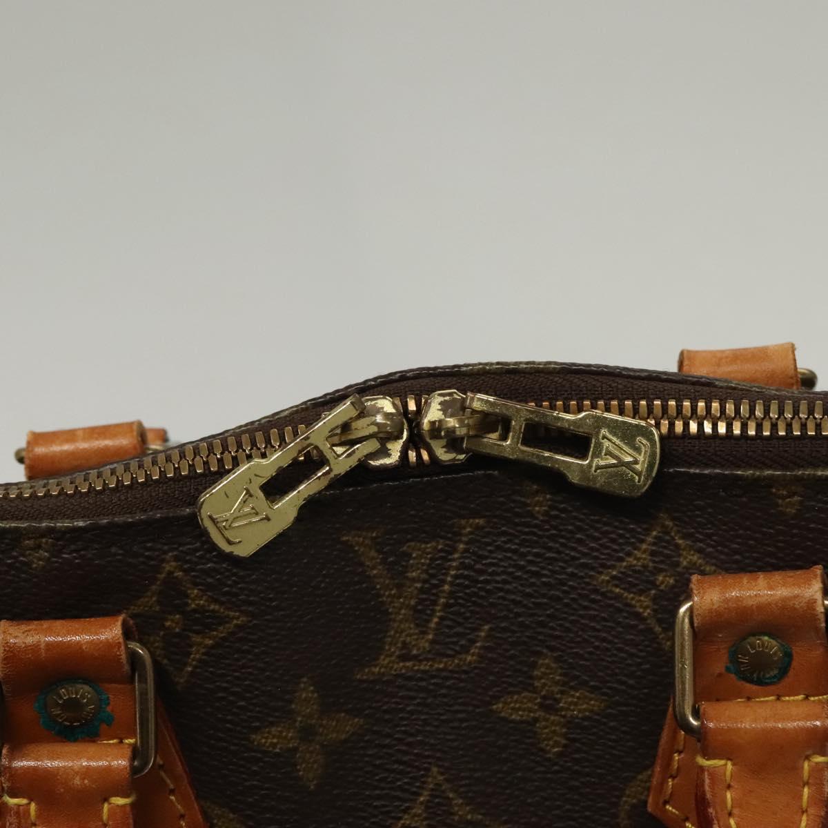 Monogram Alma Hand Bag