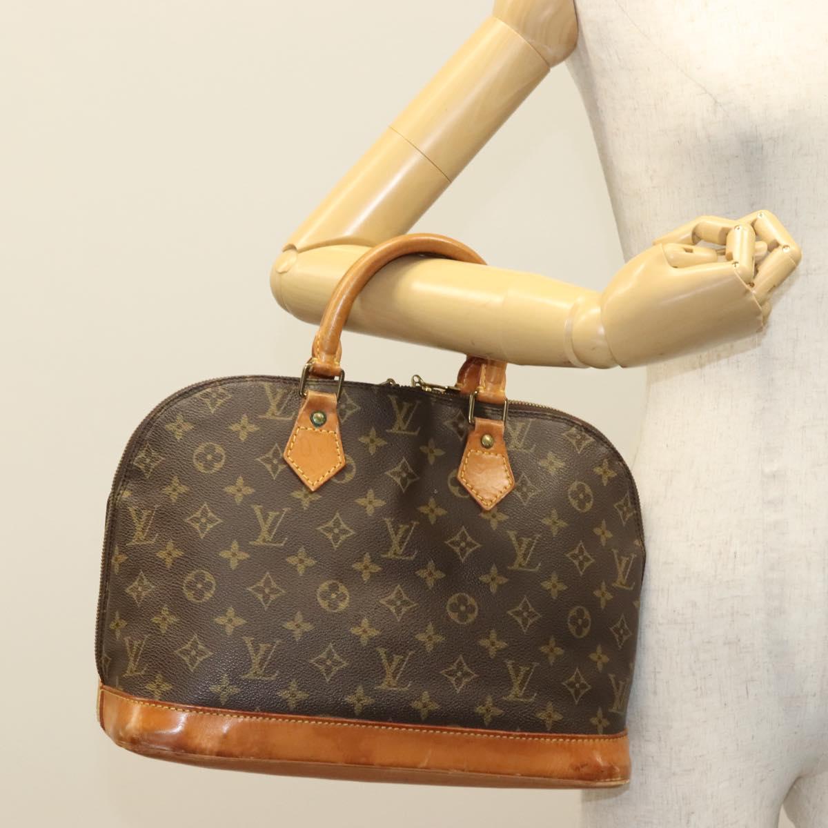 Monogram Alma Hand Bag