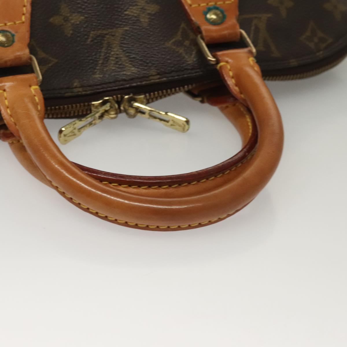 Monogram Alma Hand Bag