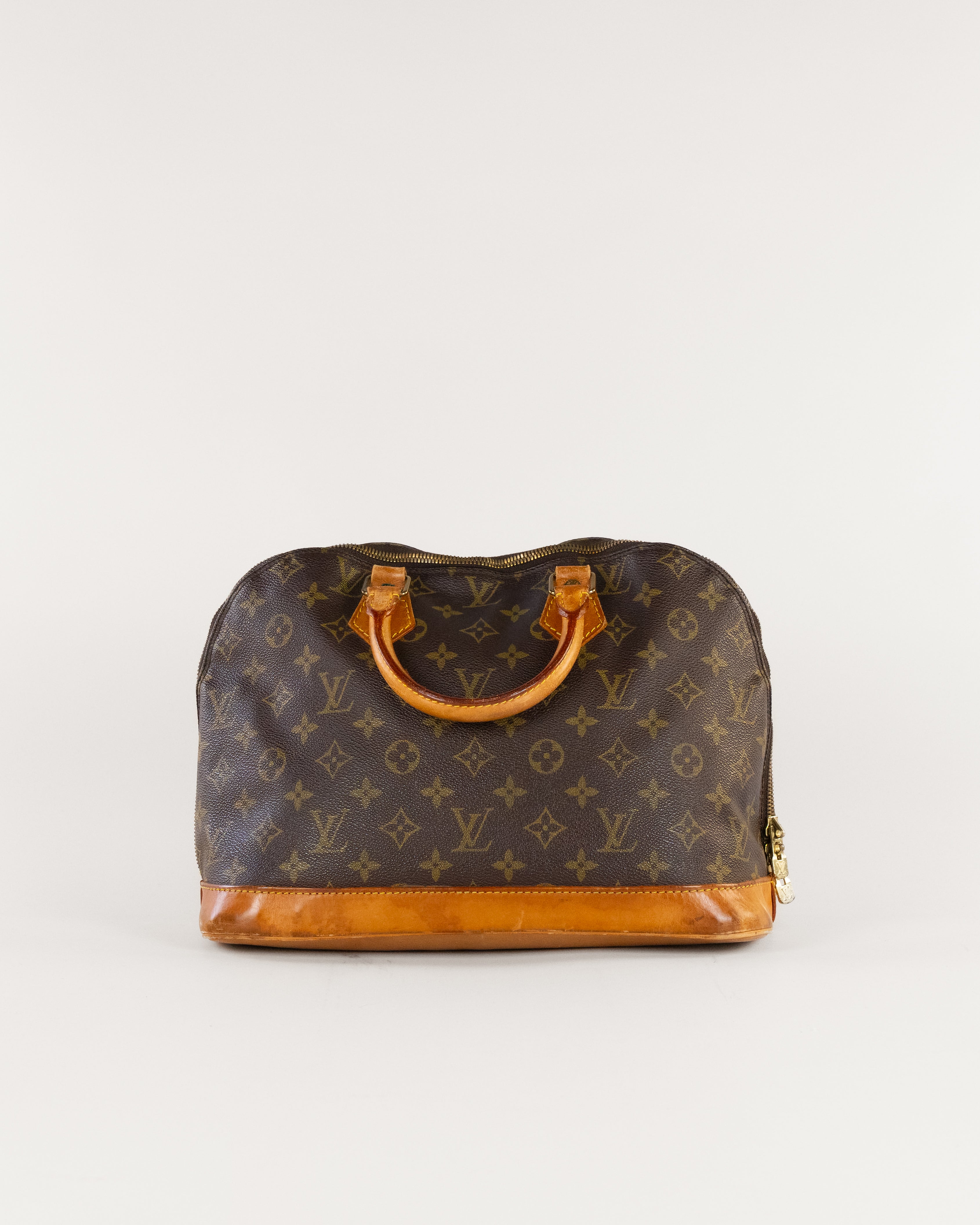 Monogram Alma Hand Bag