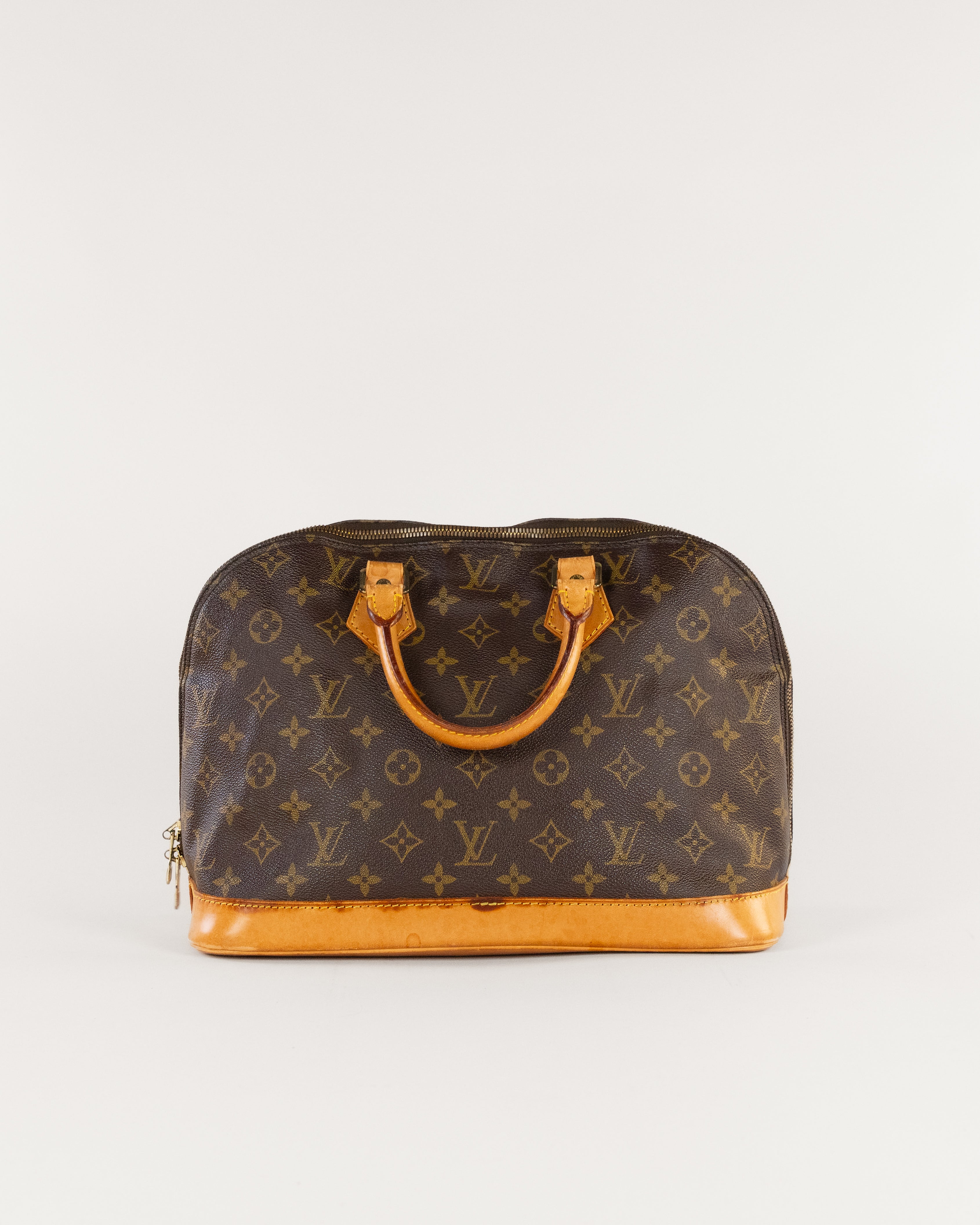 Monogram Alma Hand Bag