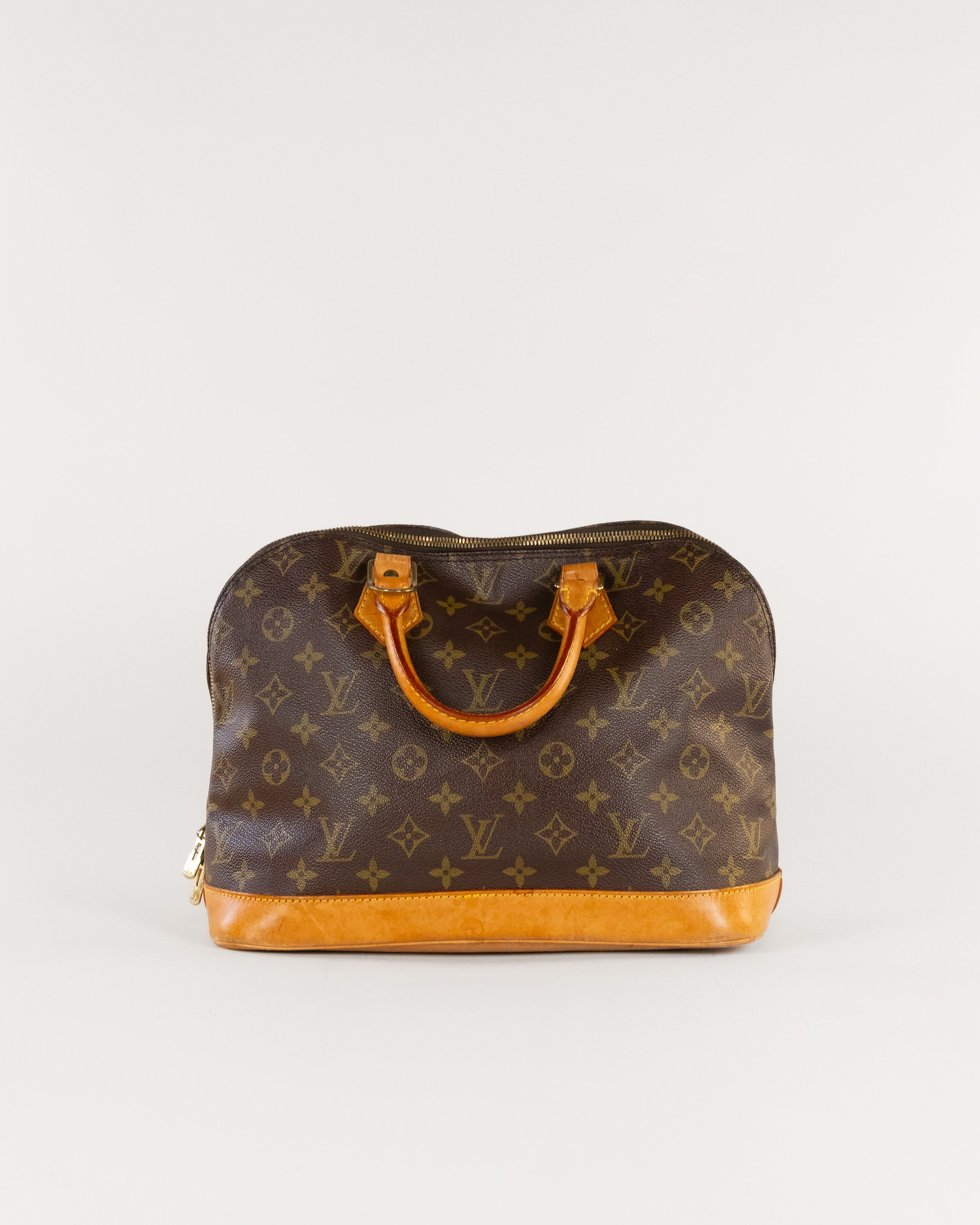 Monogram Alma Hand Bag