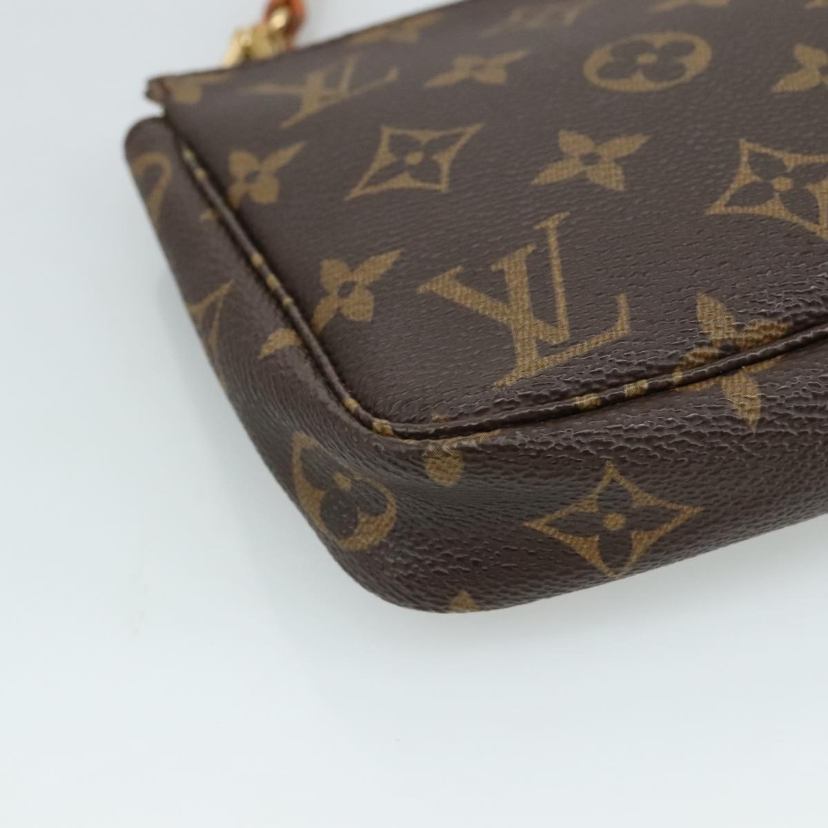 Monogram Pochette -tarvikepussi