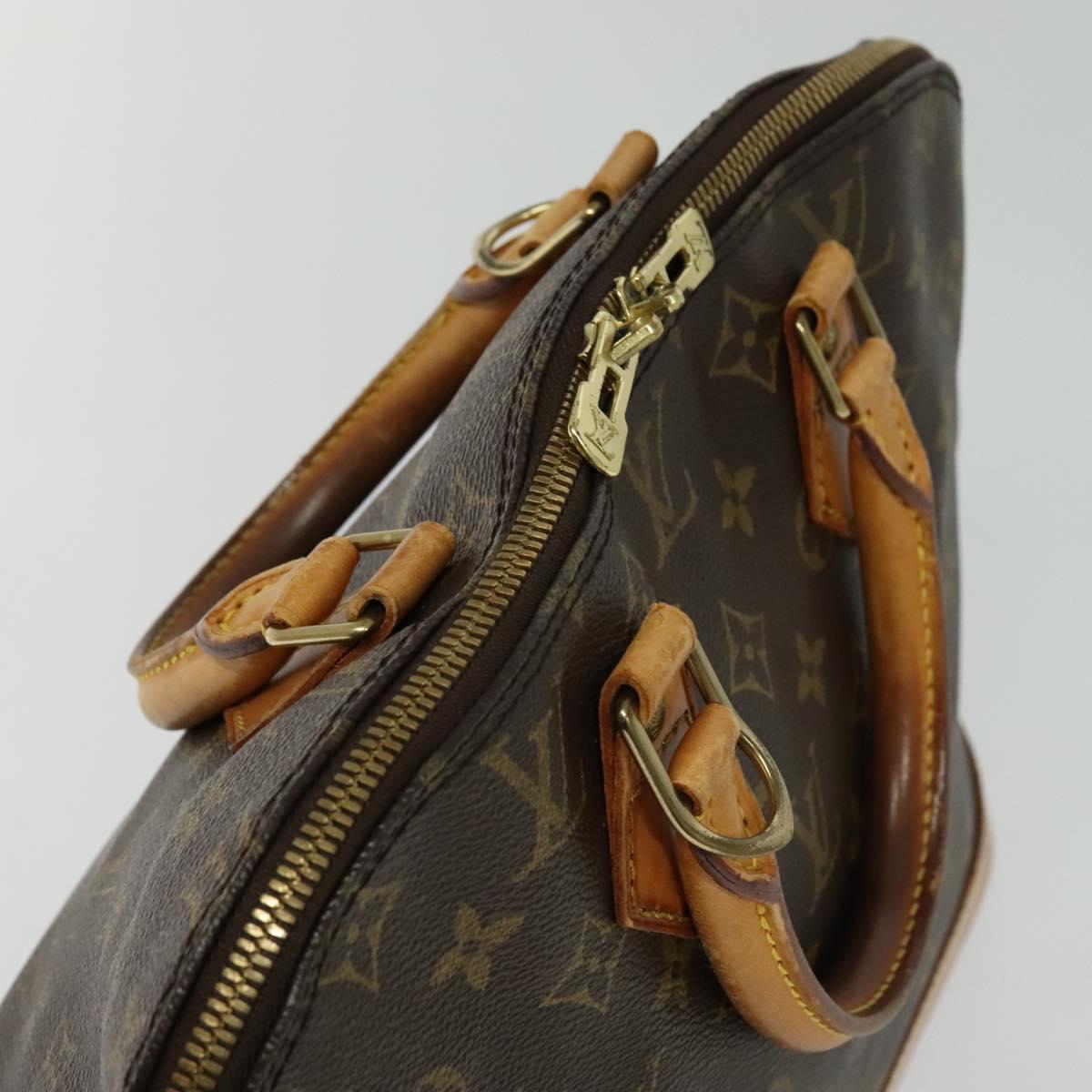 Monogram Alma Hand Bag